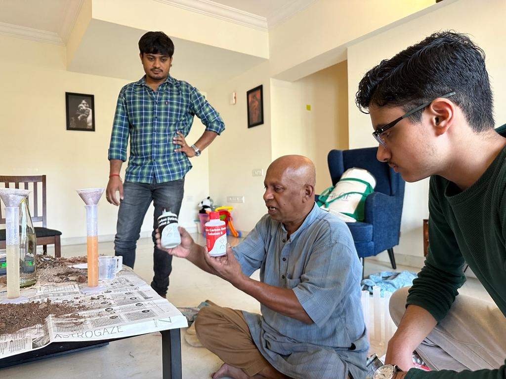 Soil Vasu performing citizen science experiments with soil.